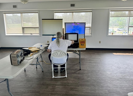 Cecil setting up Slide Show Family Reunion 2024